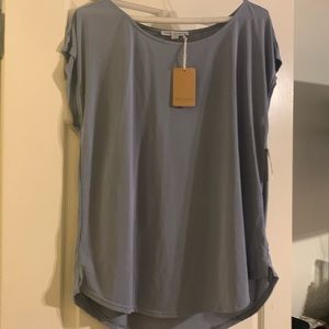 Ladies top size large. Green Envelope Brand